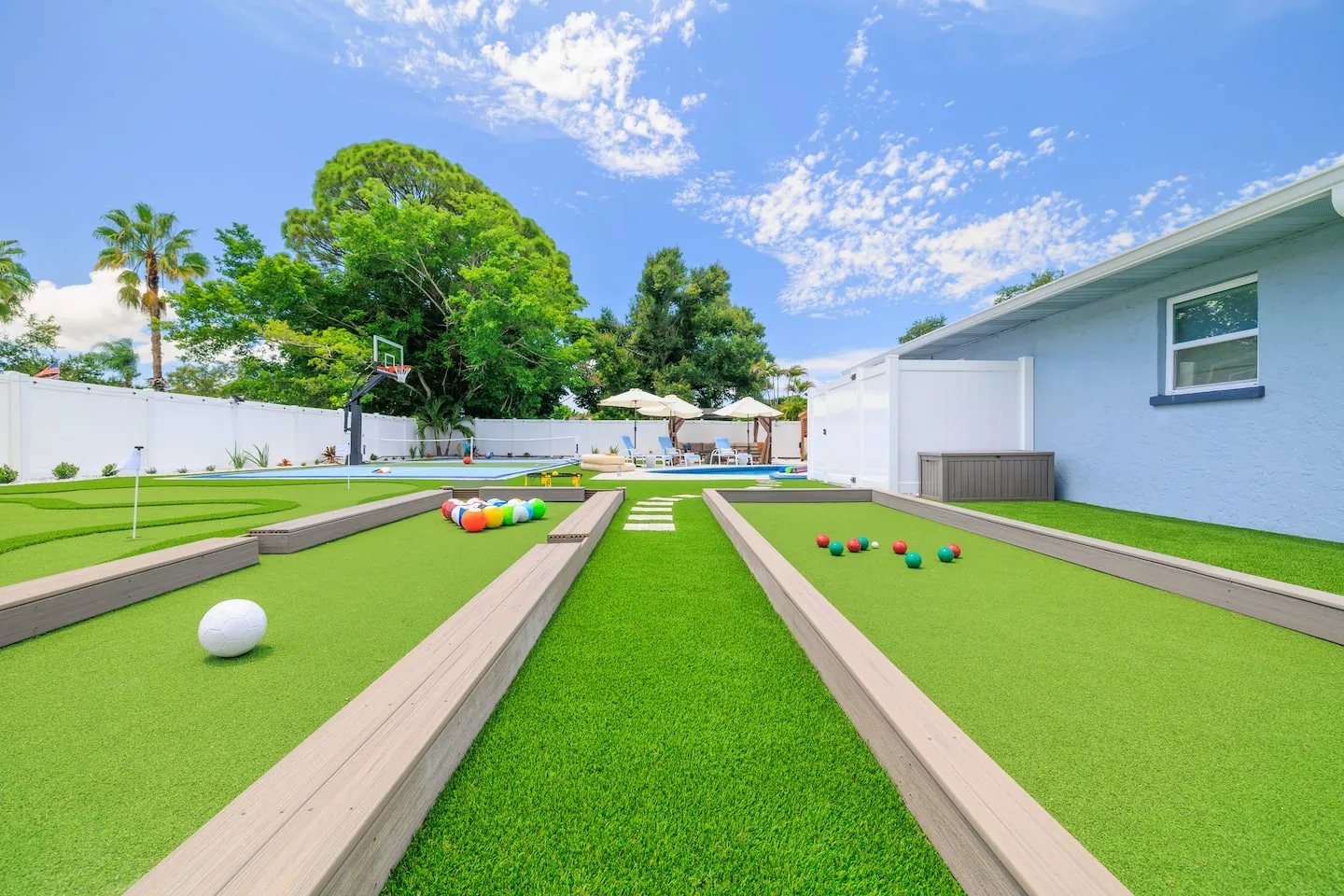The Breezy Palm: bocce and snookball lawn
