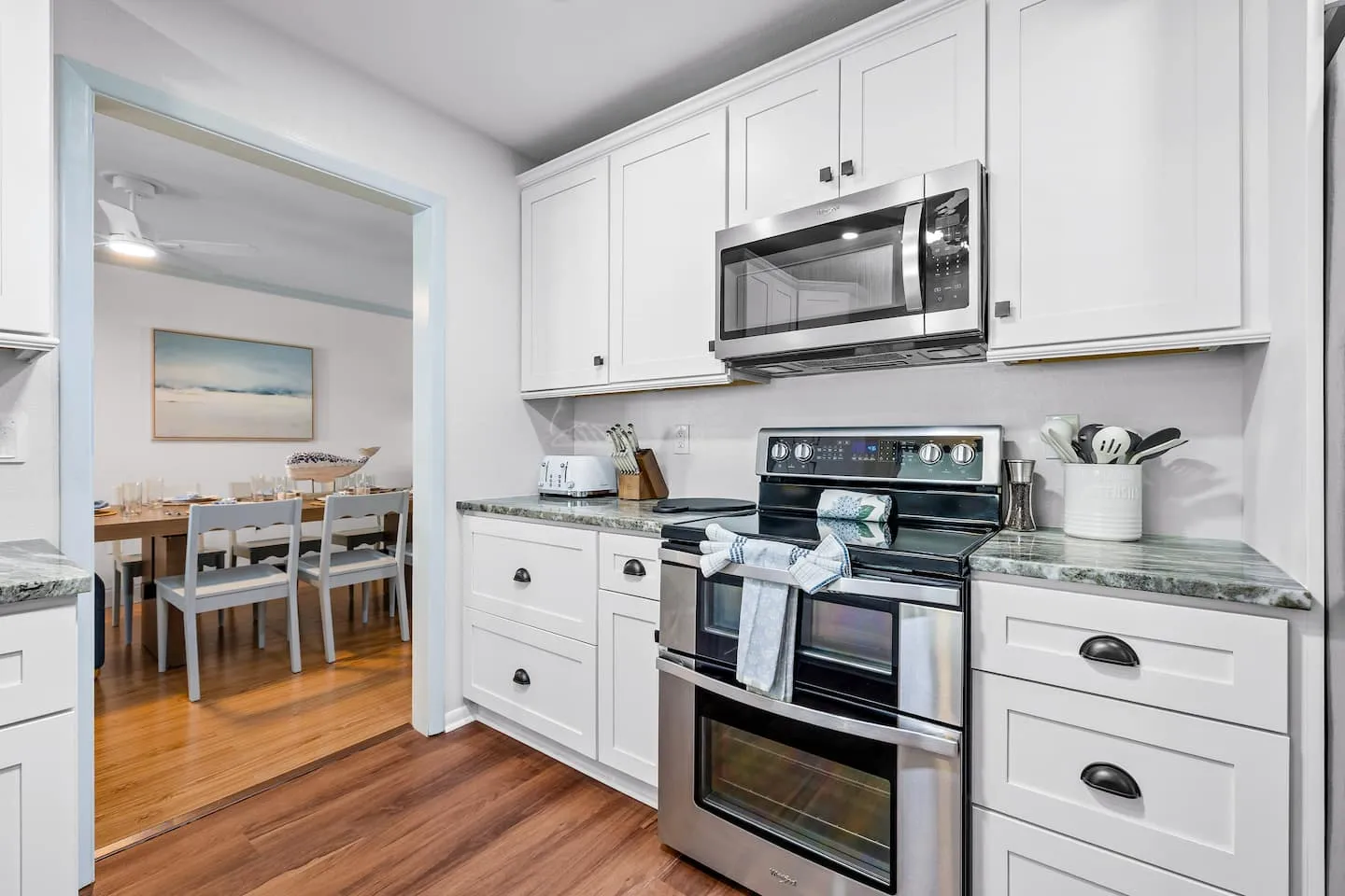 The Breezy Palm: kitchen with stainless appliances
