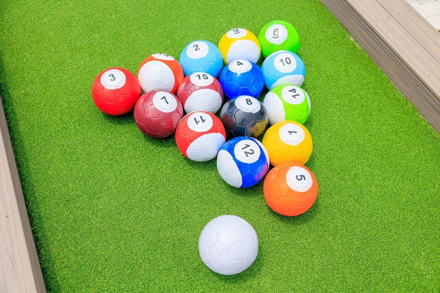 The Breezy Palm: snookball balls on the lawn