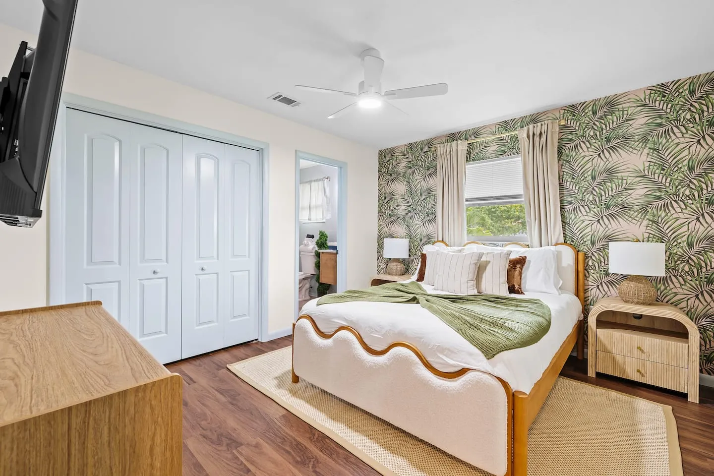 The Breezy Palm: bedroom with wallpaper