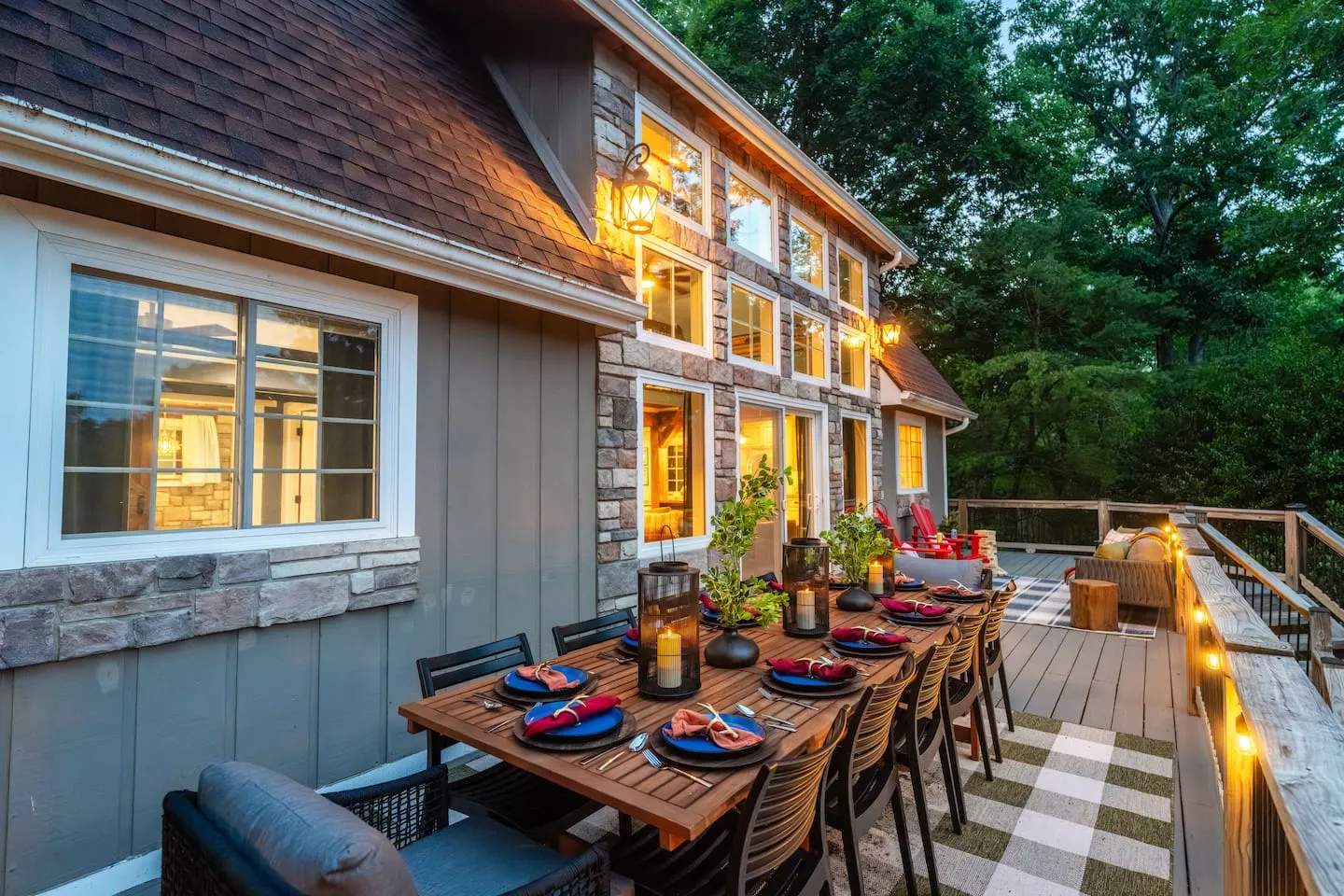 Honey Hollow: deck dining table set for a group at dusk