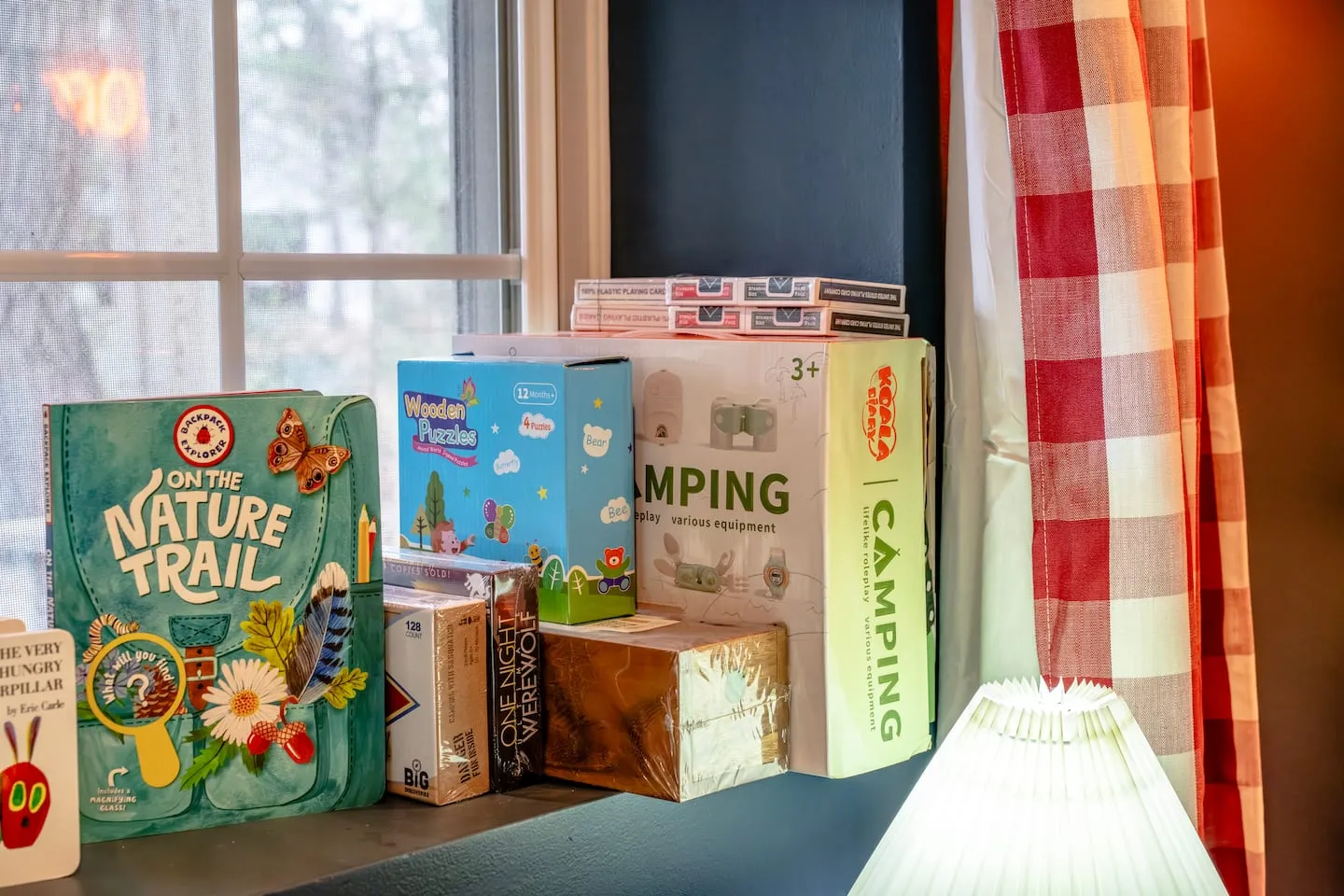 Honey Hollow: shelf of board games