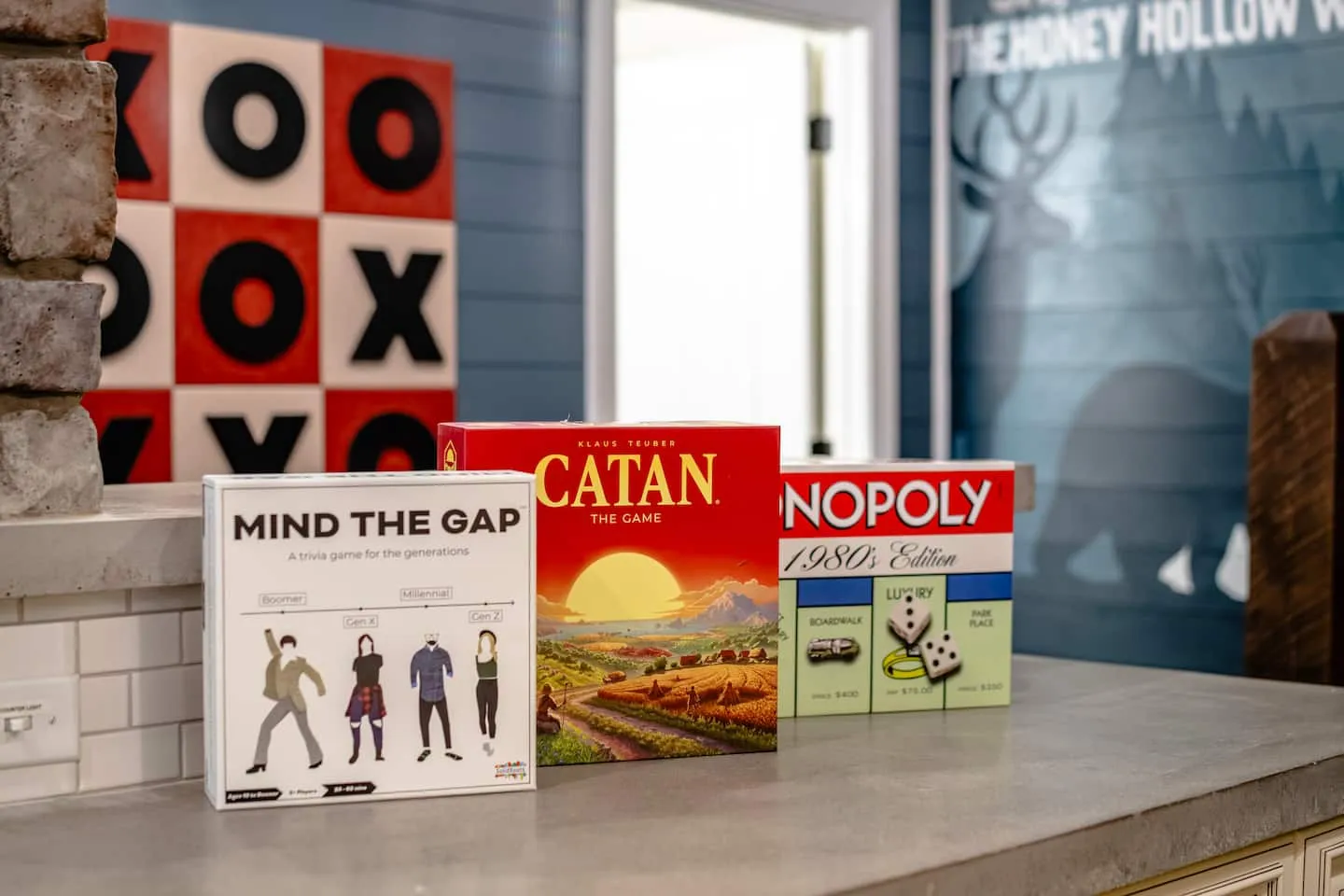 Honey Hollow: board games including Catan and Monopoly