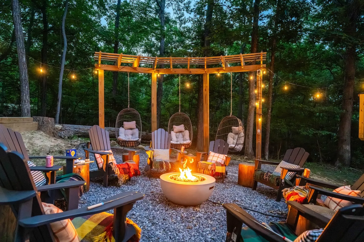 Honey Hollow: fire pit and pergola at night