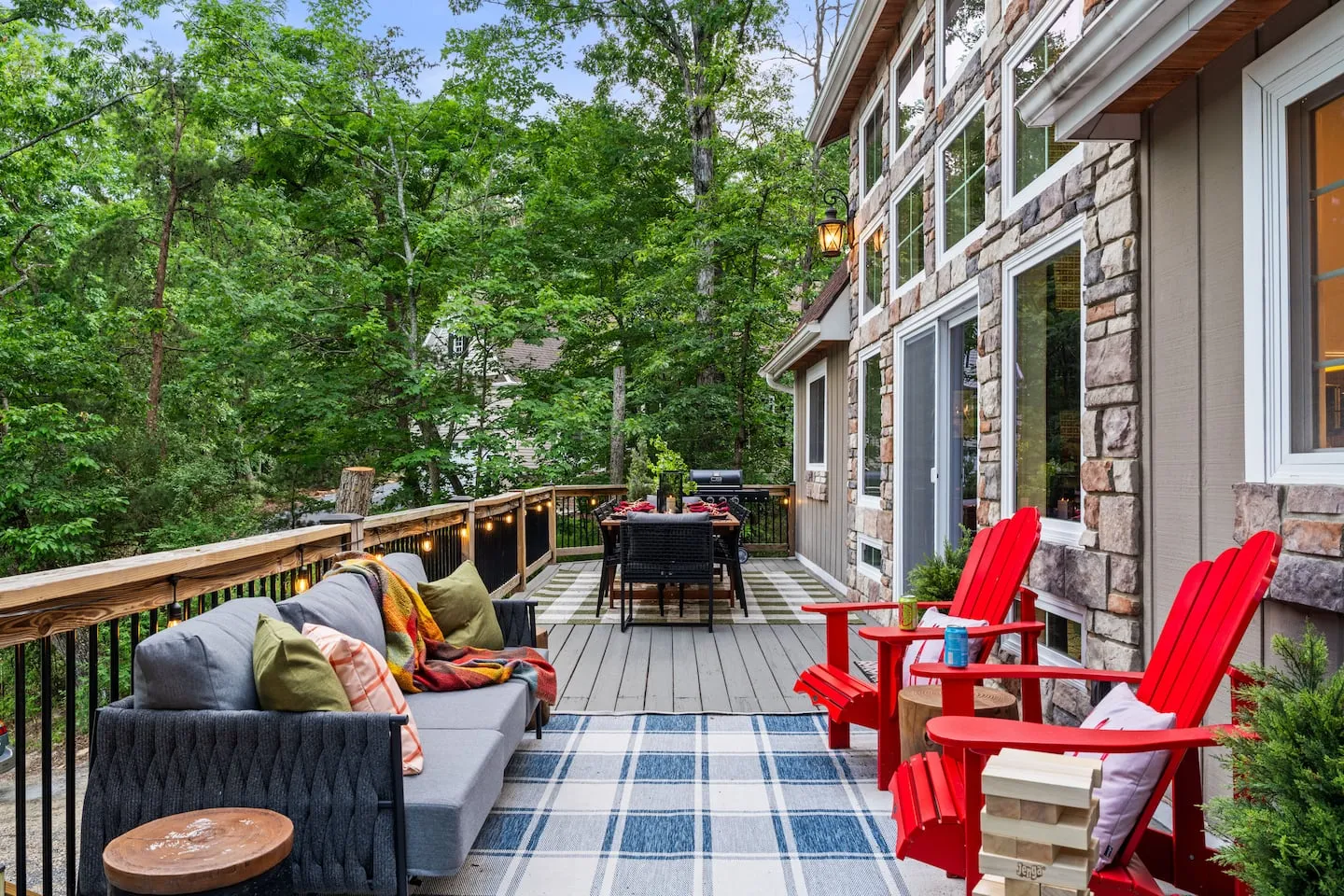 Honey Hollow: deck with red Adirondack chairs